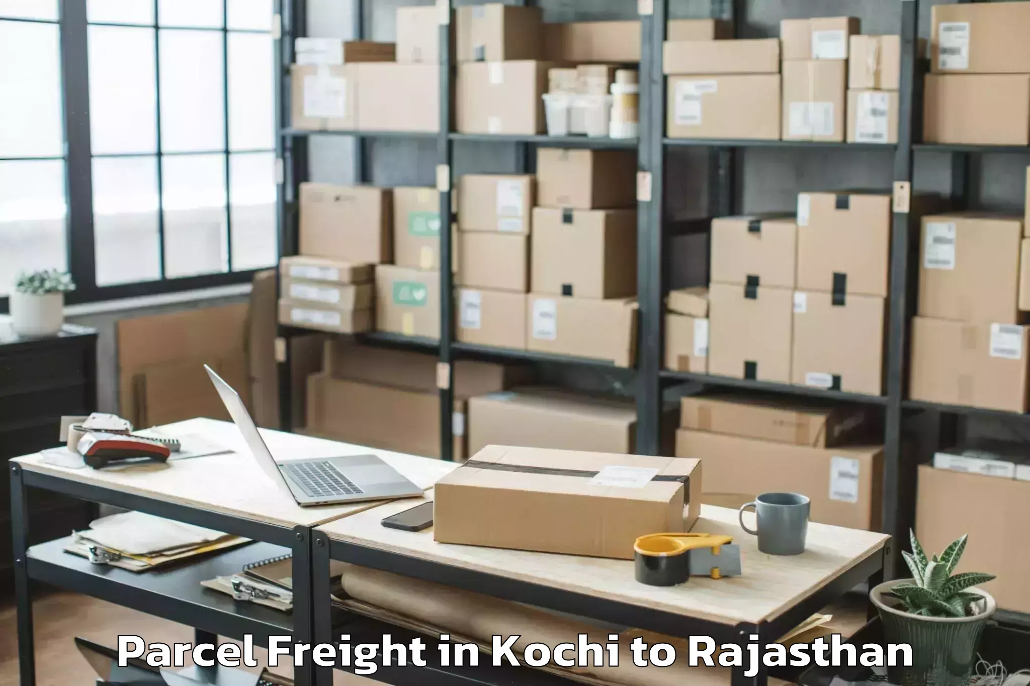 Book Kochi to Chauth Ka Barwara Parcel Freight Online